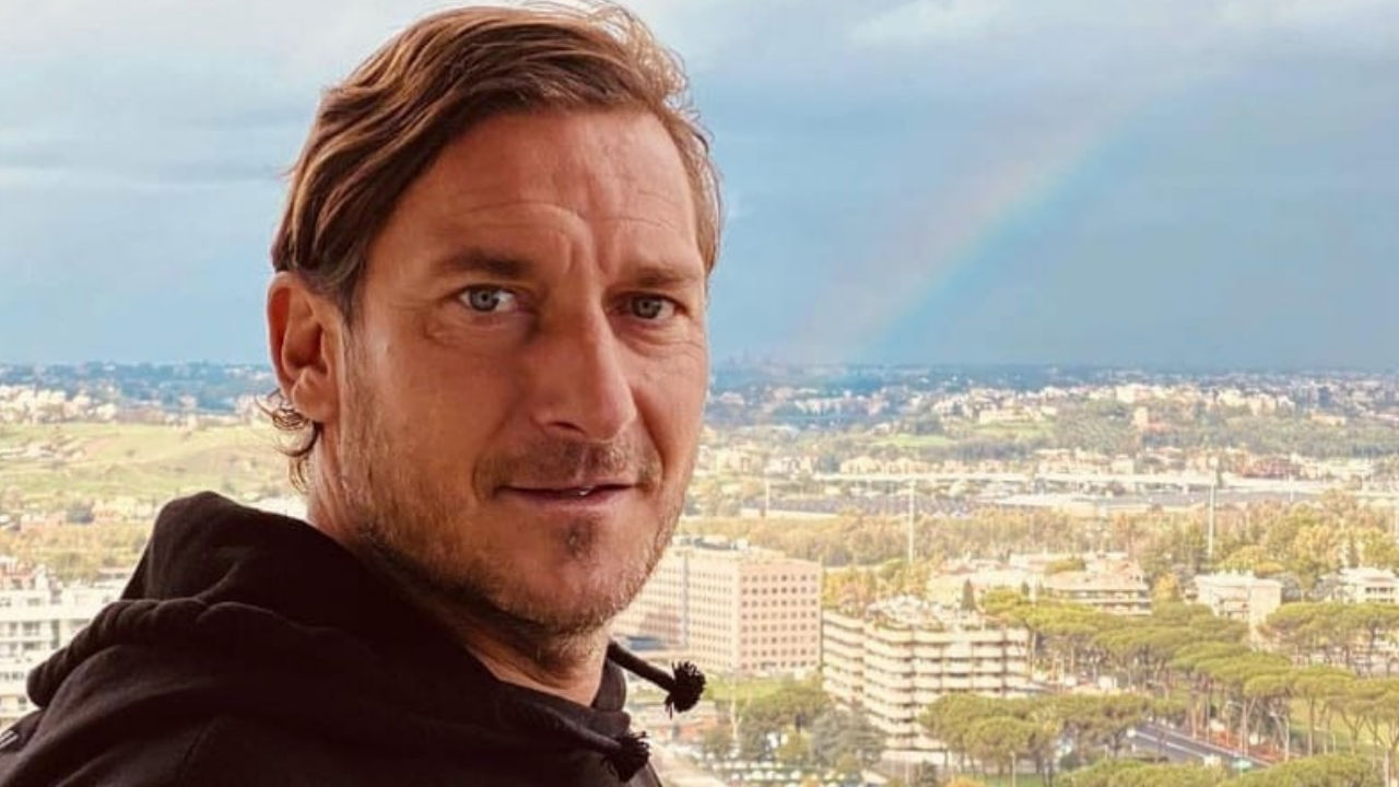 totti foto con arcobaleno