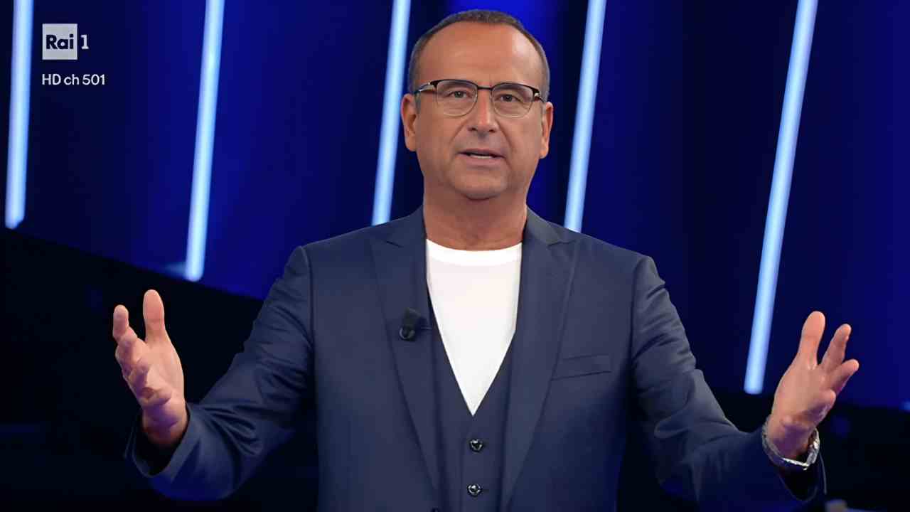 Carlo Conti Sanremo braccia aperte