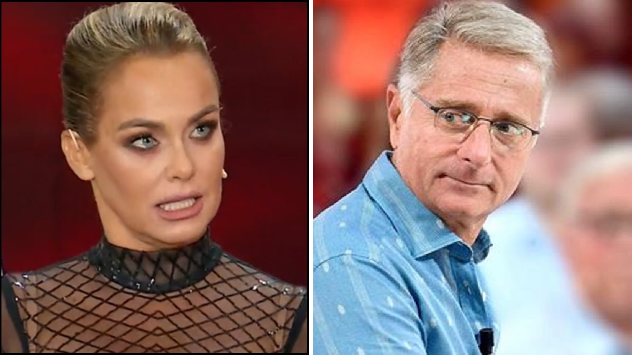 Paolo Bonolis Sonia Bruganelli camicia azzurra