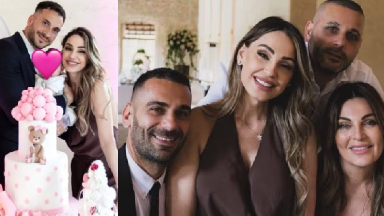 Anna Tatangelo e il compagno Giacomo Buttaroni con la figlia